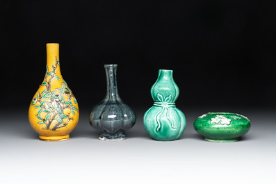 Four Chinese monochrome wares and two wooden stands, 19th C.