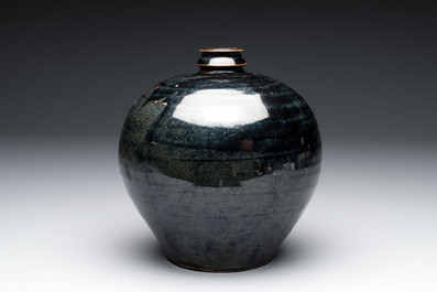 A Chinese Jizhou tortoiseshell-glazed tea bowl, a ewer and a black-glazed vase, Jin and later