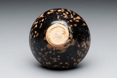 A Chinese Jizhou tortoiseshell-glazed tea bowl, a ewer and a black-glazed vase, Jin and later