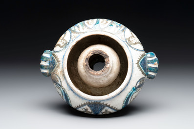 A polychrome Qajar ewer and a gilt bronze-mounted vessel, Iran, 19th C.