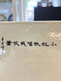 A Chinese famille rose plaque with a sage and a lady in a garden, signed Huang Can 黃燦, Republic