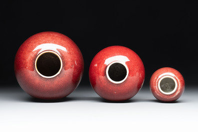 Three Chinese copper-red-glazed water pots, Kangxi mark, 19th C.