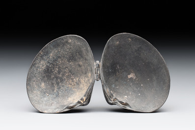 A small Chinese silver clam-shaped box with animals design, Tang/Song