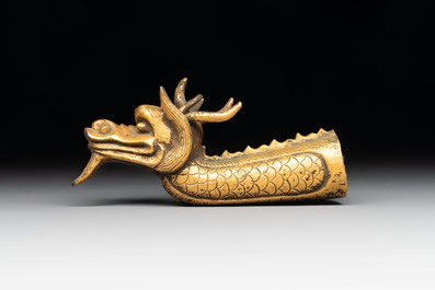 A Chinese gilt-bronze ornament in the form of a dragon, 18th C.