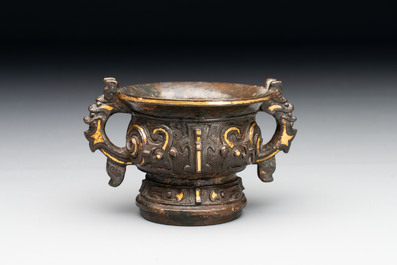A Chinese archaistic gold and silver-inlaid bronze miniature censer, Ming