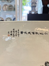 A Chinese famille rose plaque with a sage and a lady in a garden, signed Huang Can 黃燦, Republic