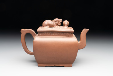 A Chinese Yixing stoneware 'lion and brocade ball' teapot and cover, Qianlong