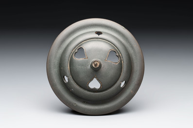 A Chinese bronze tripod censer and cover, Sui/Tang