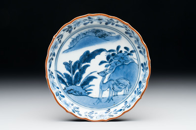A Japanese blue and white 'rabbit' cup and a 'deer' plate, Edo, 17th C.
