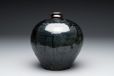 A Chinese Jizhou tortoiseshell-glazed tea bowl, a ewer and a black-glazed vase, Jin and later