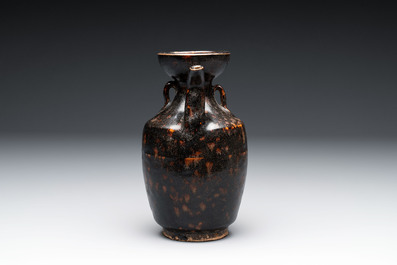 A Chinese Jizhou tortoiseshell-glazed tea bowl, a ewer and a black-glazed vase, Jin and later