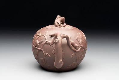 A Chinese Yixing stoneware 'squirrels among grapevines' teapot and cover, Kangxi