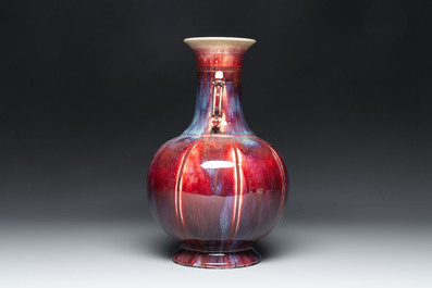 A Chinese flamb&eacute;-glazed vase with 'chilong' handles, 19th C.