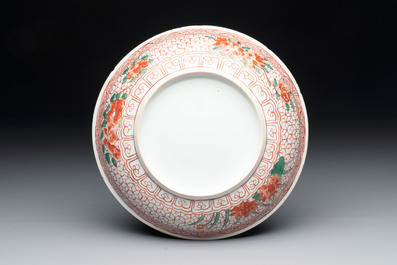 A Chinese wucai plate with floral design, Kangxi