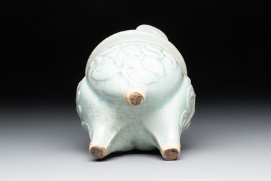A Chinese qingbai tripod censer with floral relief design, Song/Yuan