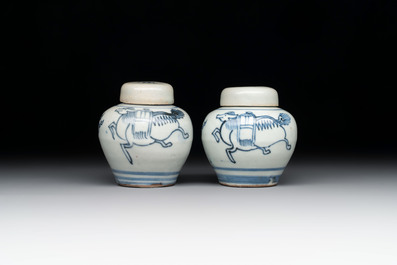 A pair of Chinese white-glazed vases and a pair of blue and white covered jars, Wanli mark and of the period