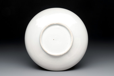 A Chinese Dehua blanc de Chine incised 'peony' plate, 17/18th C.