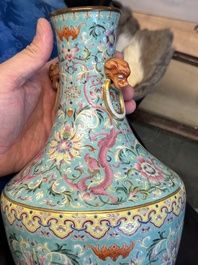 An imperial Chinese turquoise-ground famille rose 'chilong and flower scrolls' vase, Jiaqing mark and of the period