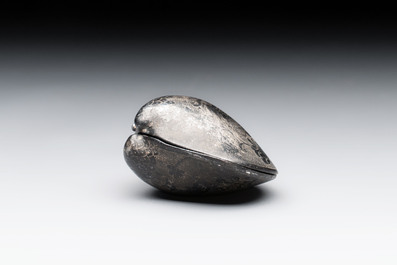 A small Chinese silver clam-shaped box with animals design, Tang/Song