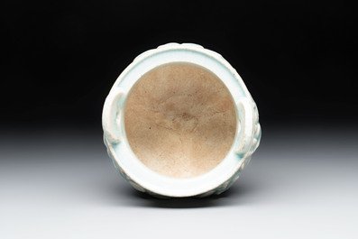 A Chinese qingbai tripod censer with floral relief design, Song/Yuan
