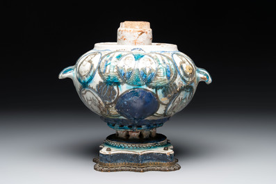 A polychrome Qajar ewer and a gilt bronze-mounted vessel, Iran, 19th C.