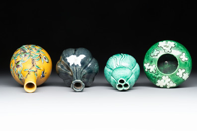 Four Chinese monochrome wares and two wooden stands, 19th C.