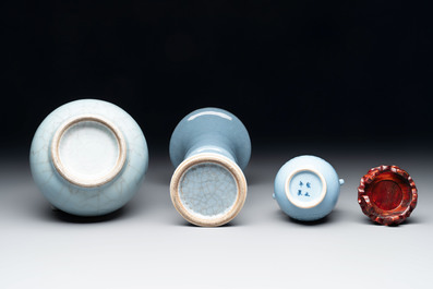 Three Chinese claire-de-lune vases, one with a wooden stand, Yongzheng mark, 19/20th C.