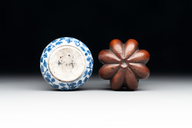 A Chinese blue and white double-gourd snuff bottle and a huali snuff bottle, Xuande and Qianlong mark, 18th C.