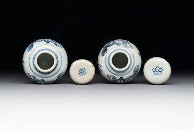 A pair of Chinese white-glazed vases and a pair of blue and white covered jars, Wanli mark and of the period