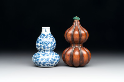 A Chinese blue and white double-gourd snuff bottle and a huali snuff bottle, Xuande and Qianlong mark, 18th C.