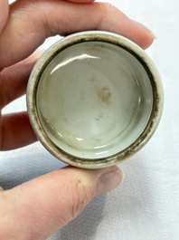 A pair of Chinese claire-de-lune jars and covers on wooden stands, Kangxi mark, 19th C.