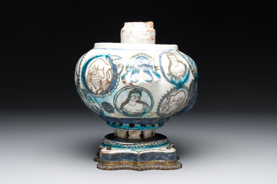 A polychrome Qajar ewer and a gilt bronze-mounted vessel, Iran, 19th C.