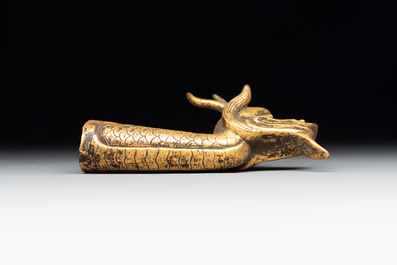 A Chinese gilt-bronze ornament in the form of a dragon, 18th C.
