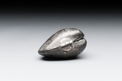 A small Chinese silver clam-shaped box with animals design, Tang/Song