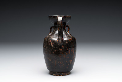 A Chinese Jizhou tortoiseshell-glazed tea bowl, a ewer and a black-glazed vase, Jin and later