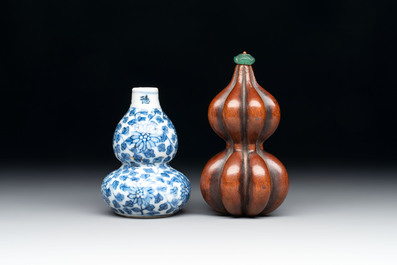 A Chinese blue and white double-gourd snuff bottle and a huali snuff bottle, Xuande and Qianlong mark, 18th C.