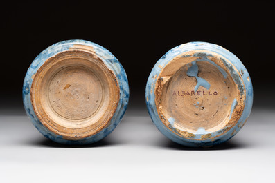 A pair of Spanish splashed blue pottery albarelli and an Italian blue, white and manganese albarello, Savona, 17/18th C.
