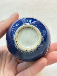Three Chinese blue-glazed miniature vases on wooden stands and a claire-de-lune seal paste box and cover, 19th C.