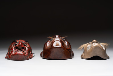Three Japanese lacquered wooden Kyogen masks, Edo, 18/19th C.