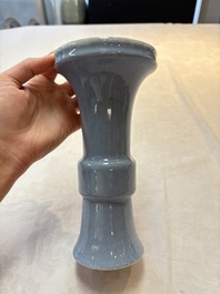 Three Chinese claire-de-lune vases, one with a wooden stand, Yongzheng mark, 19/20th C.