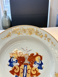 A pair of Chinese armorial dishes with the arms of Valckenier of Amsterdam for the Dutch market, Yongzheng