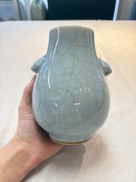 Three Chinese claire-de-lune vases, one with a wooden stand, Yongzheng mark, 19/20th C.