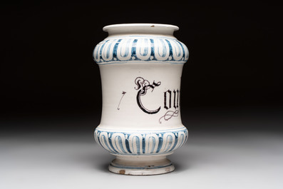 A pair of Spanish splashed blue pottery albarelli and an Italian blue, white and manganese albarello, Savona, 17/18th C.