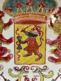 A rare Chinese famille rose armorial plate with VOC coat of arms, dated 1728, Yongzheng