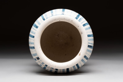A pair of Spanish splashed blue pottery albarelli and an Italian blue, white and manganese albarello, Savona, 17/18th C.