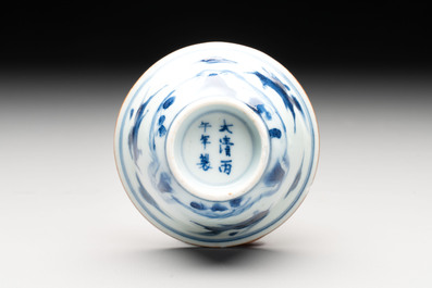 A Chinese blue and white 'flying horses' cup, Da Qing Bing Wu Nian Zhi 大清丙午年製 mark, dated 1666