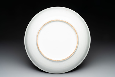 A large Chinese 'winter landscape' dish in the style of He Xuren 何許人, signed Rao Yongchang 饒永昌, dated 1902