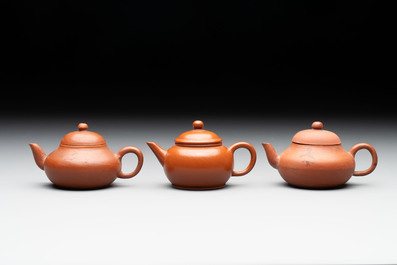 A small Chinese Yixing stoneware covered teapot and two Swatow Yixing-style covered teapots, Yixing Hui Mengchen 宜興惠孟臣製 and Shunji 順記 marks, 19/20th C