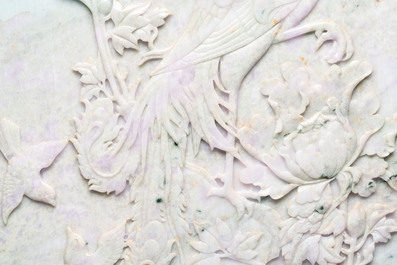 A Chinese lavender and green jadeite 'phoenix' plaque in a hongmu frame, early 20th C.