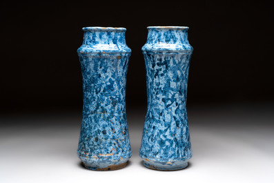 A pair of Spanish splashed blue pottery albarelli and an Italian blue, white and manganese albarello, Savona, 17/18th C.